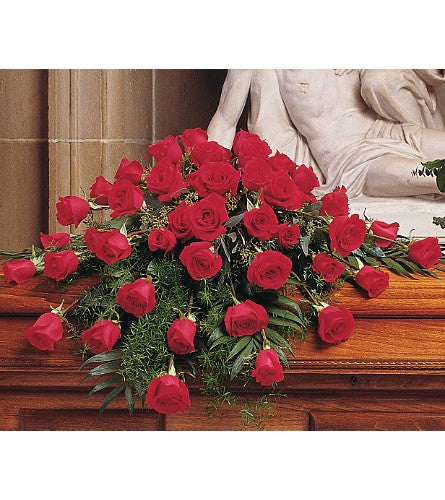 Spray para ataúd de rosas rojas florecientes